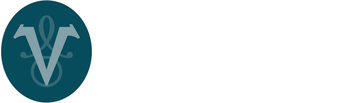 The logo for Vanitas Consulting,  featuring a dark teal circular emblem with a stylized white 'V' and symbol on the left, next to the words 'VANITAS CONSULTING' in white text on a black background.